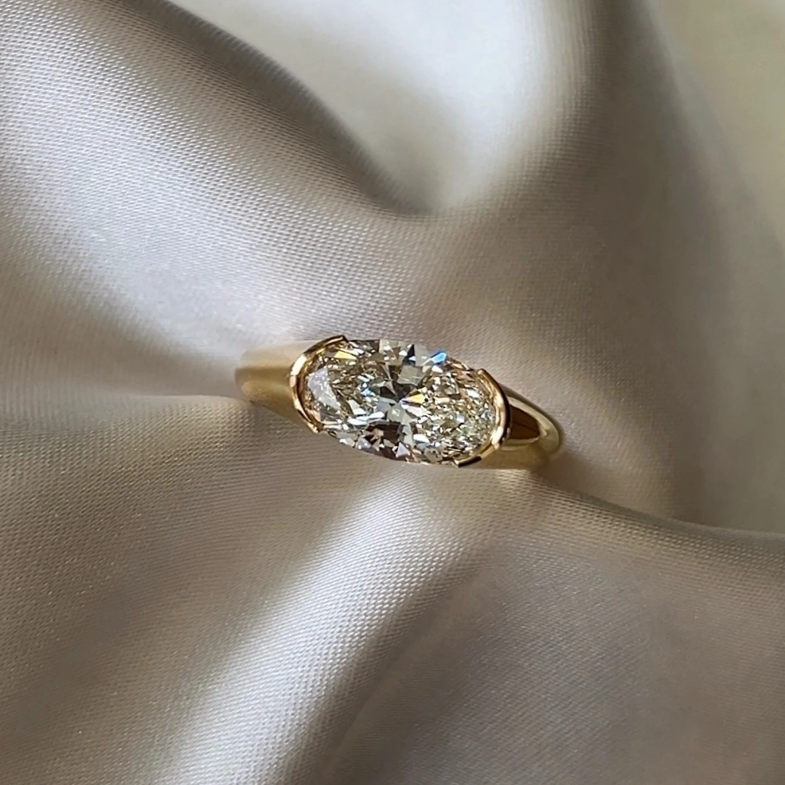 Half Bezel Set Oval Cut Diamond Signet Engagement Ring