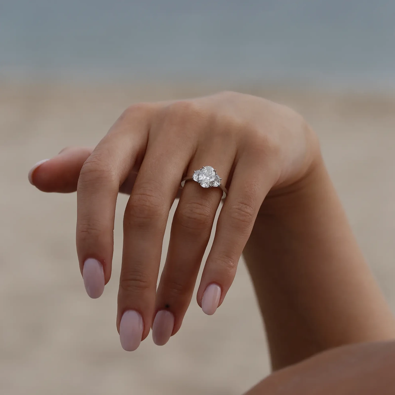 Three Stone Oval Diamond Engagement Ring with Half-Moon Diamonds