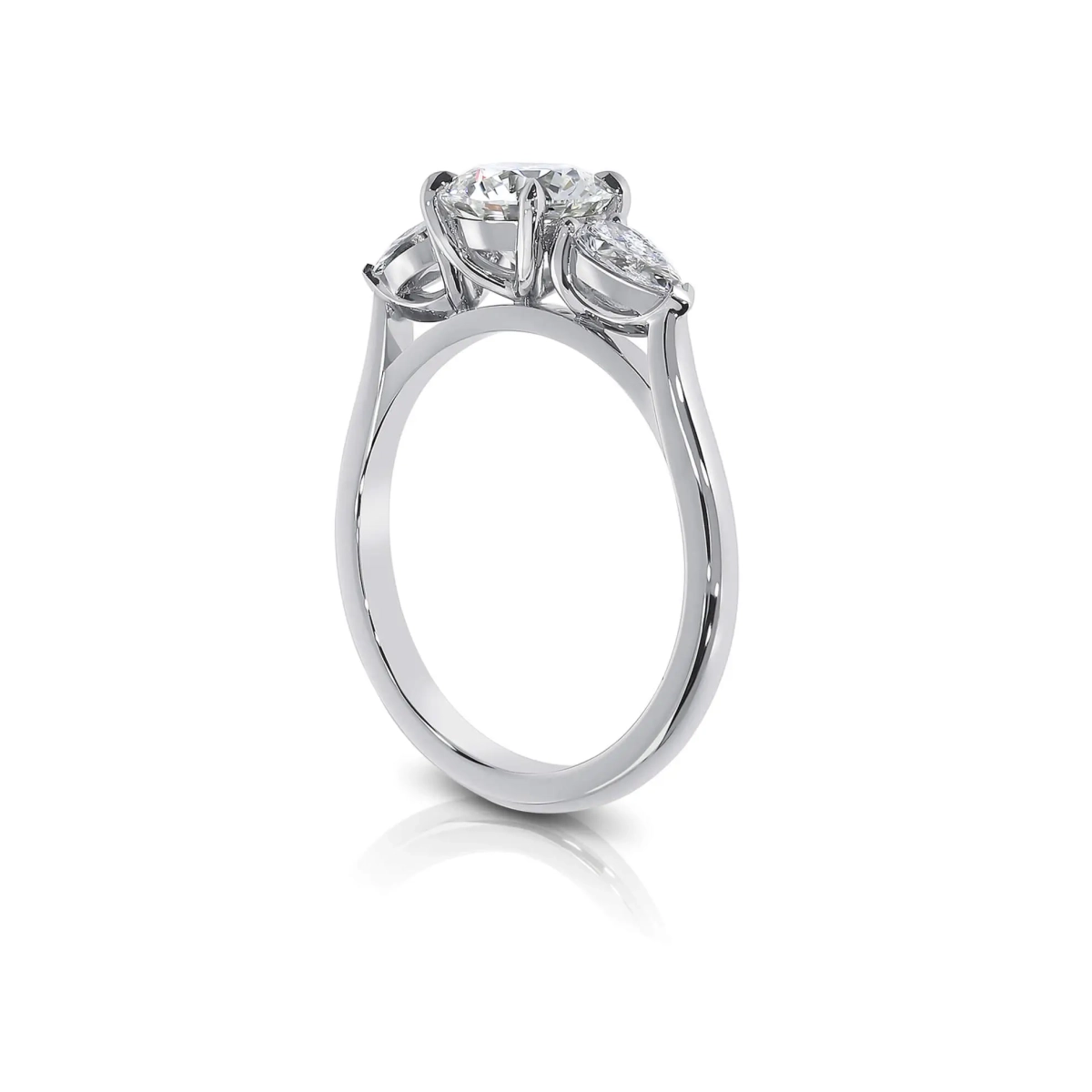 Round Diamond Trilogy Engagement Ring with Pear Shaped Side Stones